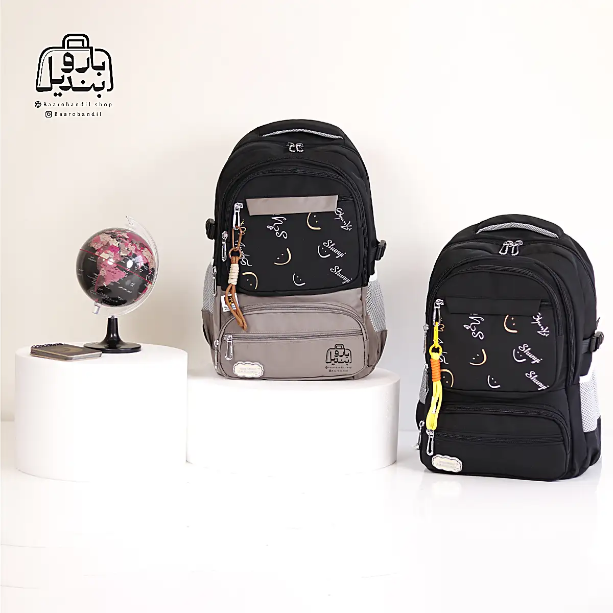 backpack-school-unique-1033-black-mocha-black-front تصویر اختصاصی از نمای جلوی کوله پشتی مدرسه یونیک ۱۰۳۳ در رنگ مشکی نسکافهای مشکی
