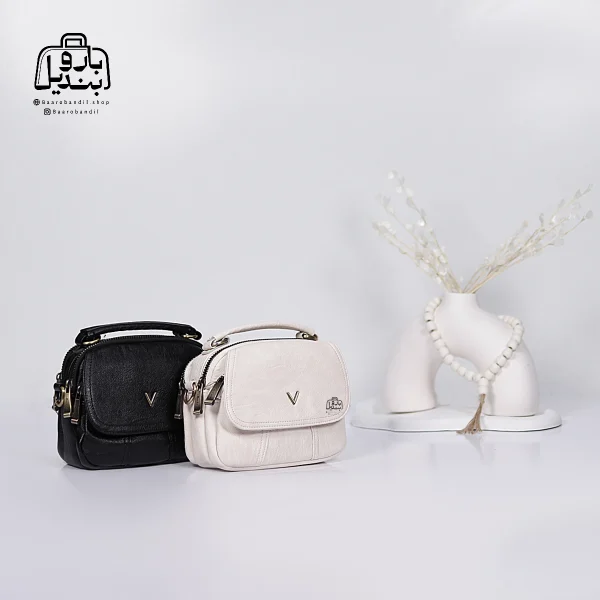 تصویر اختصاصی از نمای جلوی کیف دوشی زنانه موجیتو کد 7611 در رنگ سفید و مشکی